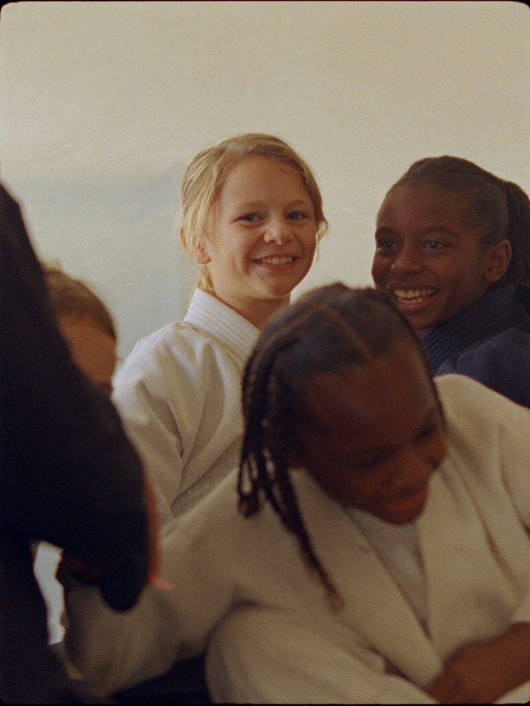 Kids practising a Jiu-Jitsu partner drill